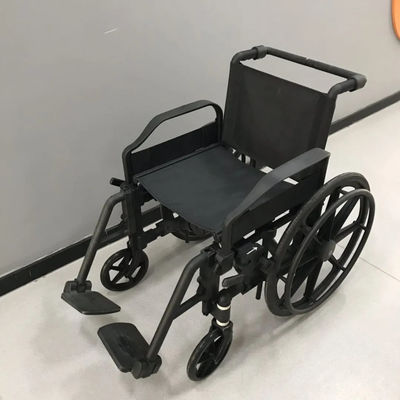 Kursi roda non-magnetik dengan ketinggian punggung 40 cm, lebar keseluruhan 65 cm dan sandaran lengan yang dapat dilepas untuk ruang MRI